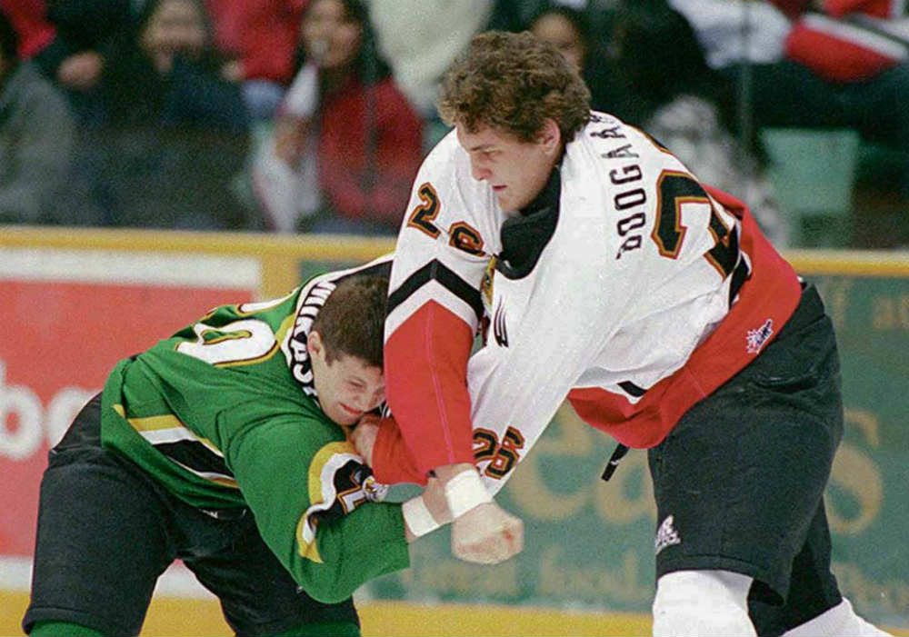 boys playing ice hockey