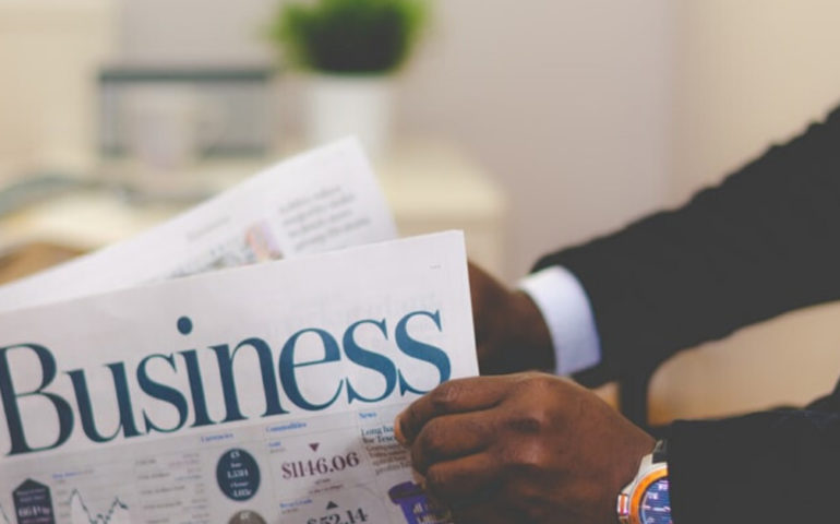 man holding business paper